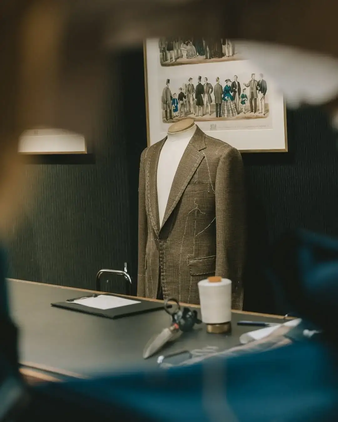 Tailored jacket on a mannequin in a tailoring atelier
