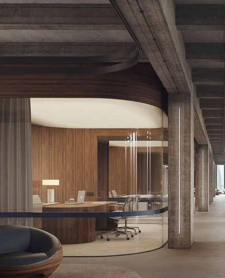 Glass-walled corner cabin in a modern corporate office