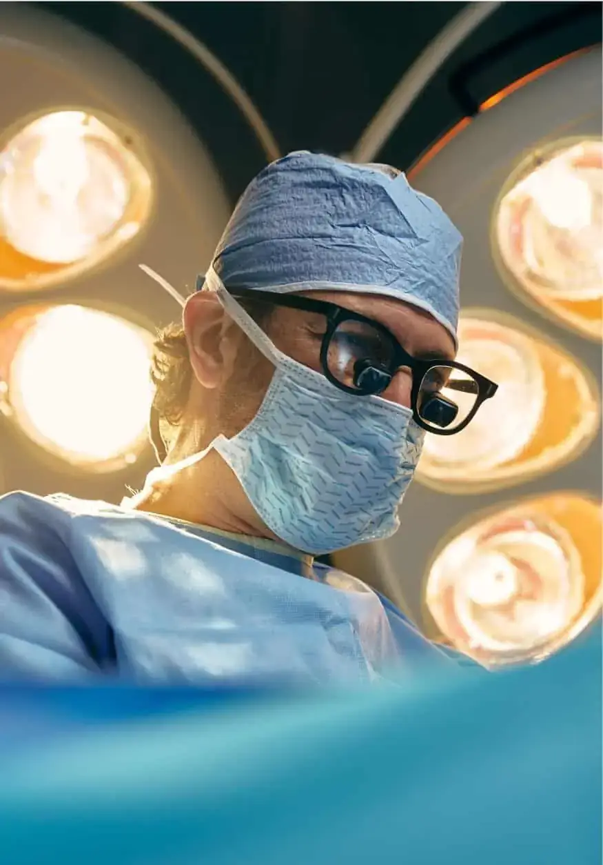 Surgeon at work in an operating theatre