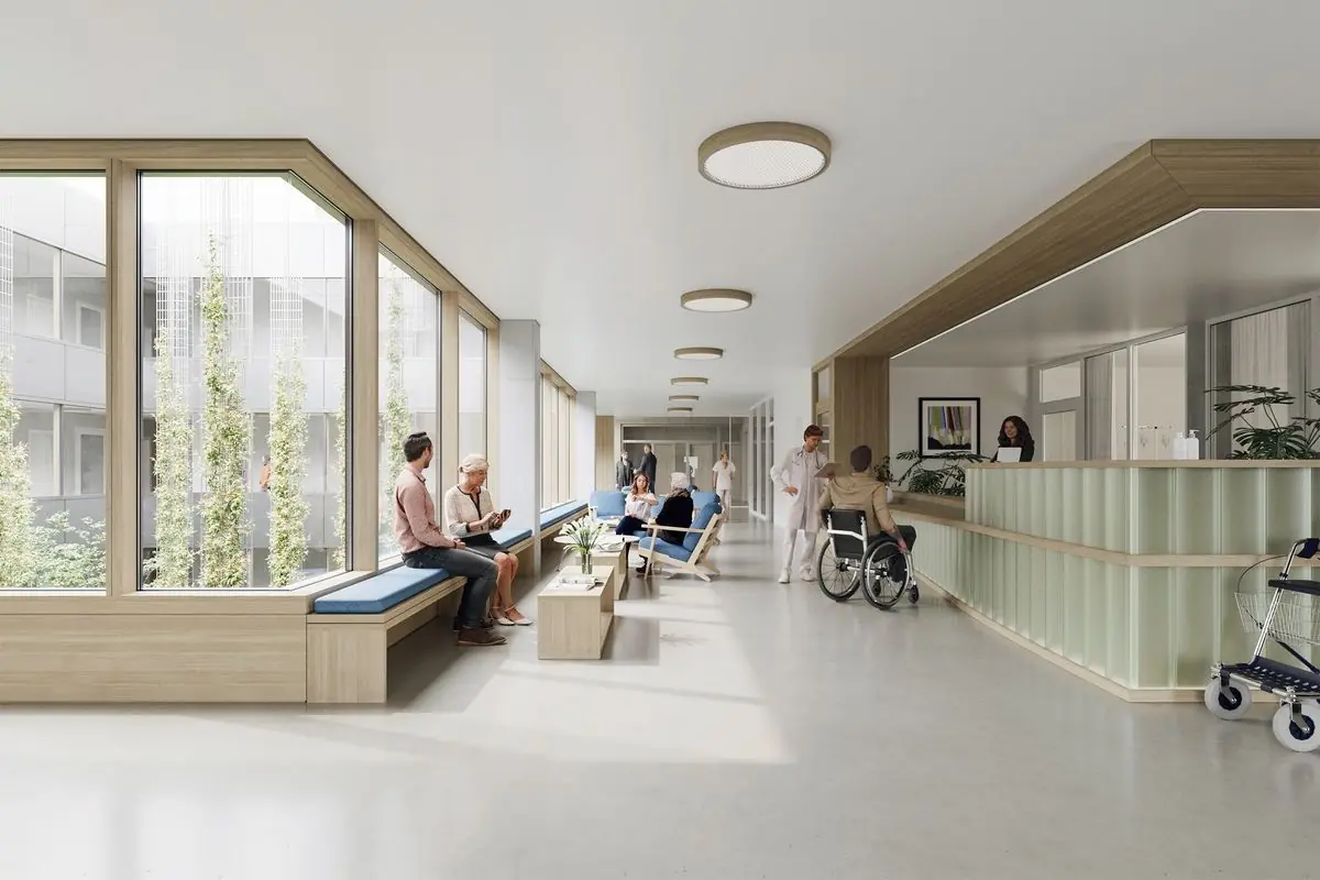 Bright hospital waiting area with patients and staff