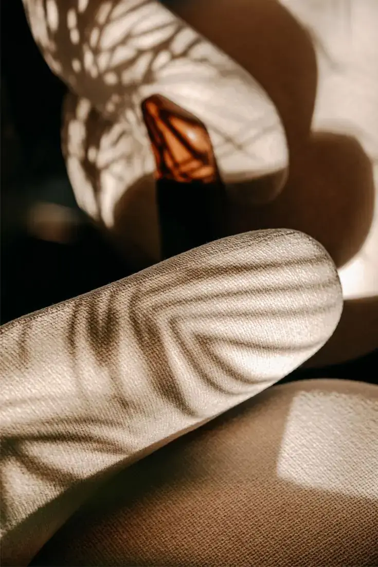 Soft fabric with palm-leaf shadows